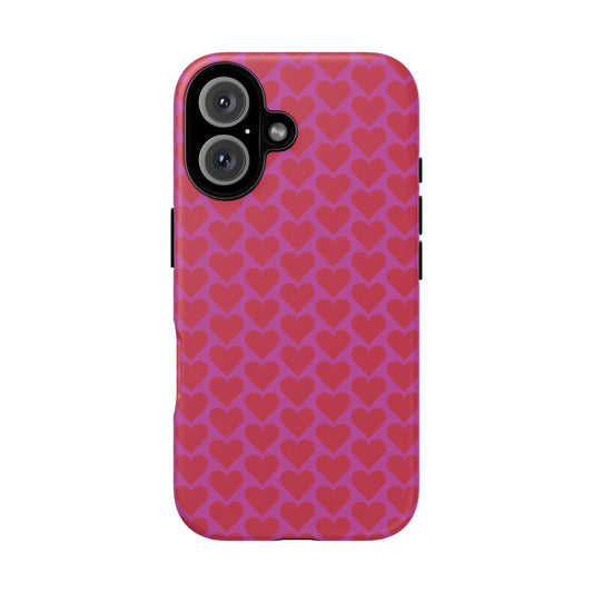 Vibrant pink heart pattern tough phone case with repeating red hearts on the back for romantic protection