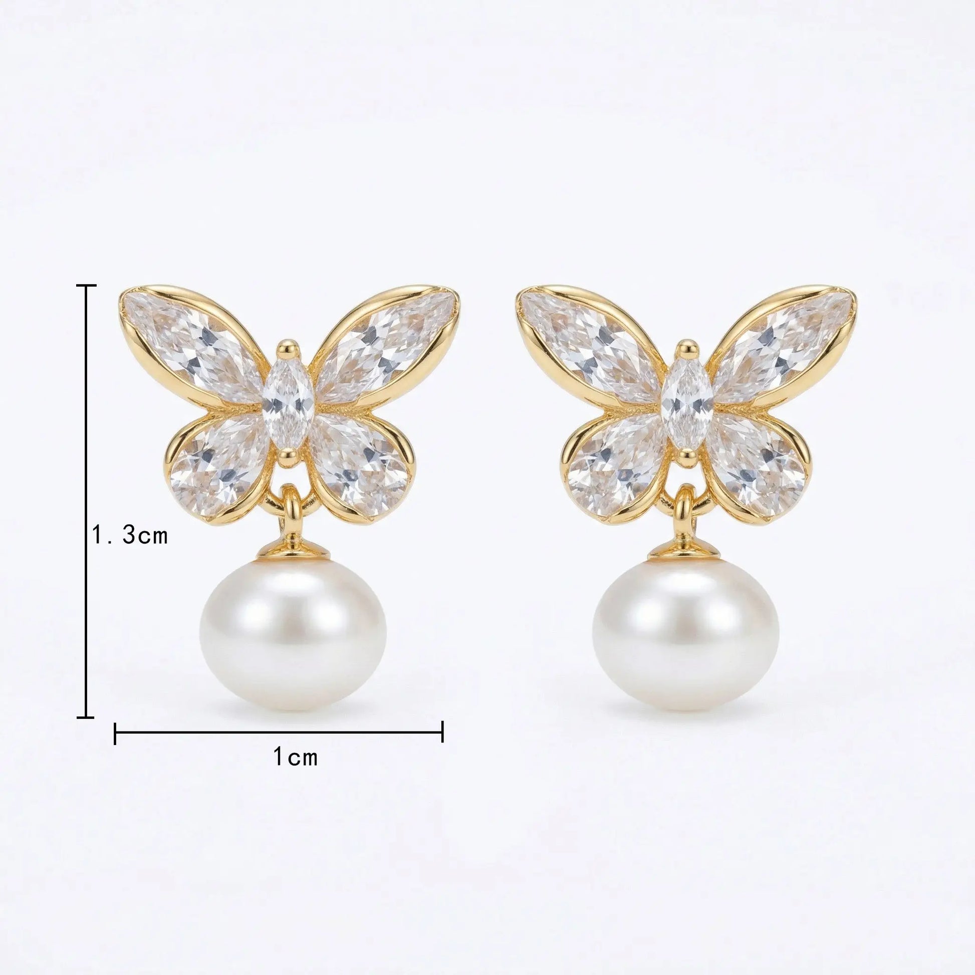 925 sterling silver elegant crystal butterfly earrings with clear wings and a lustrous pearl drop design