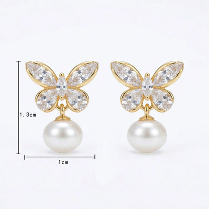 925 sterling silver elegant crystal butterfly earrings with clear wings and a lustrous pearl drop design