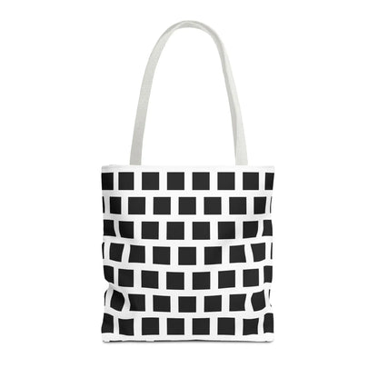 White canvas tote bag with black square pattern and matching white handles for versatile use