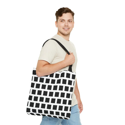 Black and white canvas tote bag with sturdy handles featuring a black square pattern for versatile use