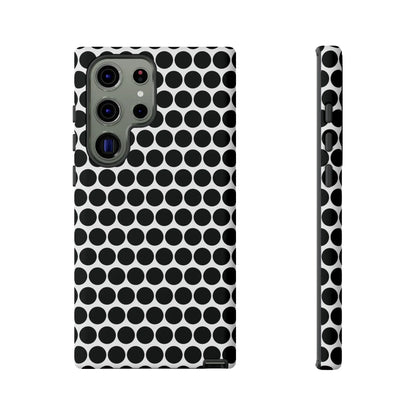 Black white dot pattern tough phone case with sleek modern design shown from the back for iphone samsung google