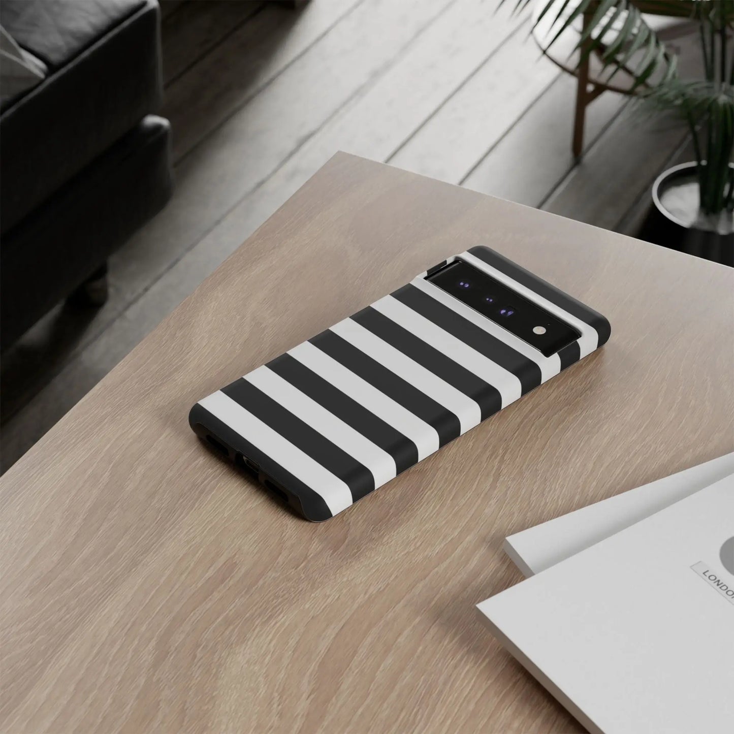 Black white stripe phone case with bold horizontal stripes shown from the back for iphone samsung pixel phones