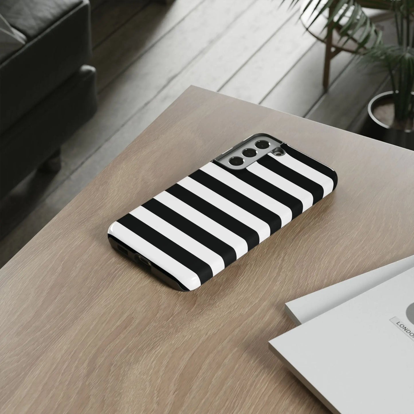 Black white stripe phone case with sleek modern design shown from the back for iphone samsung s google pixel phones