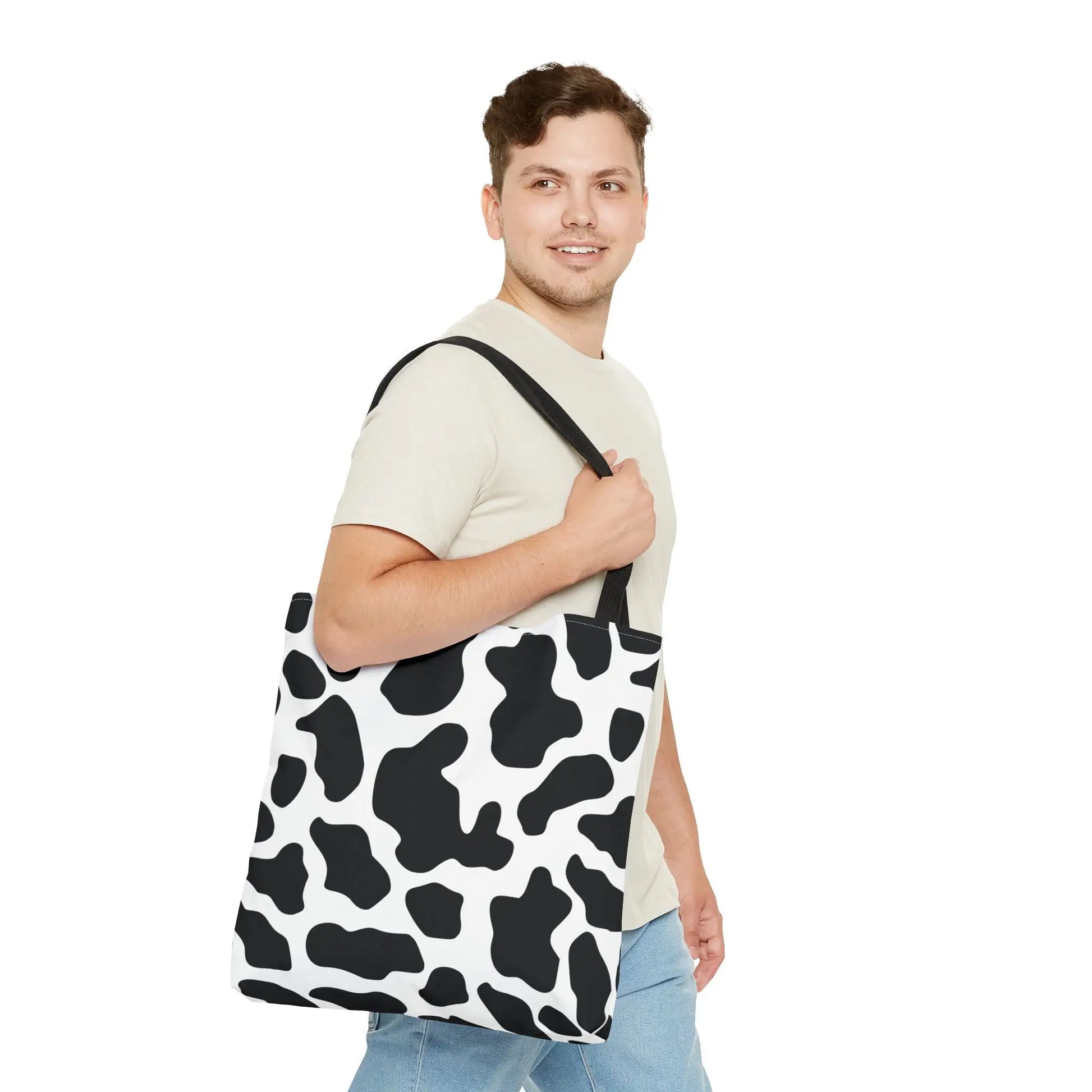 Black and white cow print canvas tote bag with black straps large reusable shopping and travel print tote bag