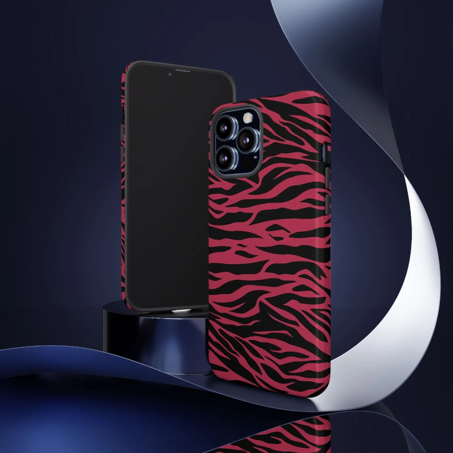 Back side of a vibrant magenta wild tiger pattern print phone case with pink and black zebra stripes for iphone 12 pro