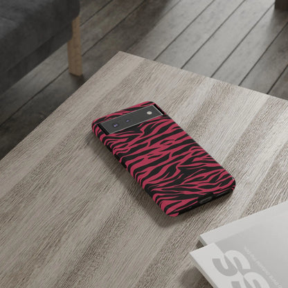 Back side of a sleek magenta wild tiger pattern print phone case with vibrant pink and black zebra-striped design