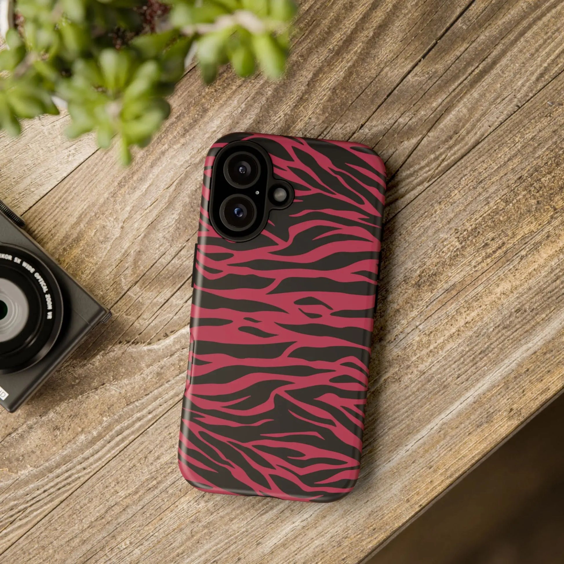 Magenta wild tiger phone case showing the back with a vibrant pink and black wild tiger pattern print design