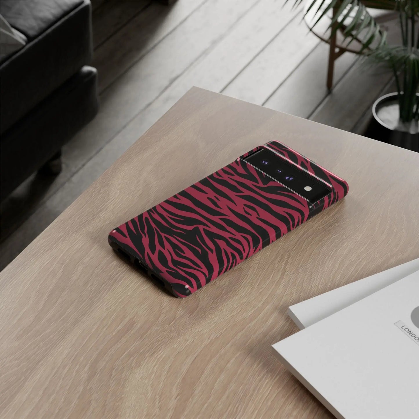 Magenta wild tiger phone case with vibrant pink and black wild tiger pattern print and a sleek glossy finish back view
