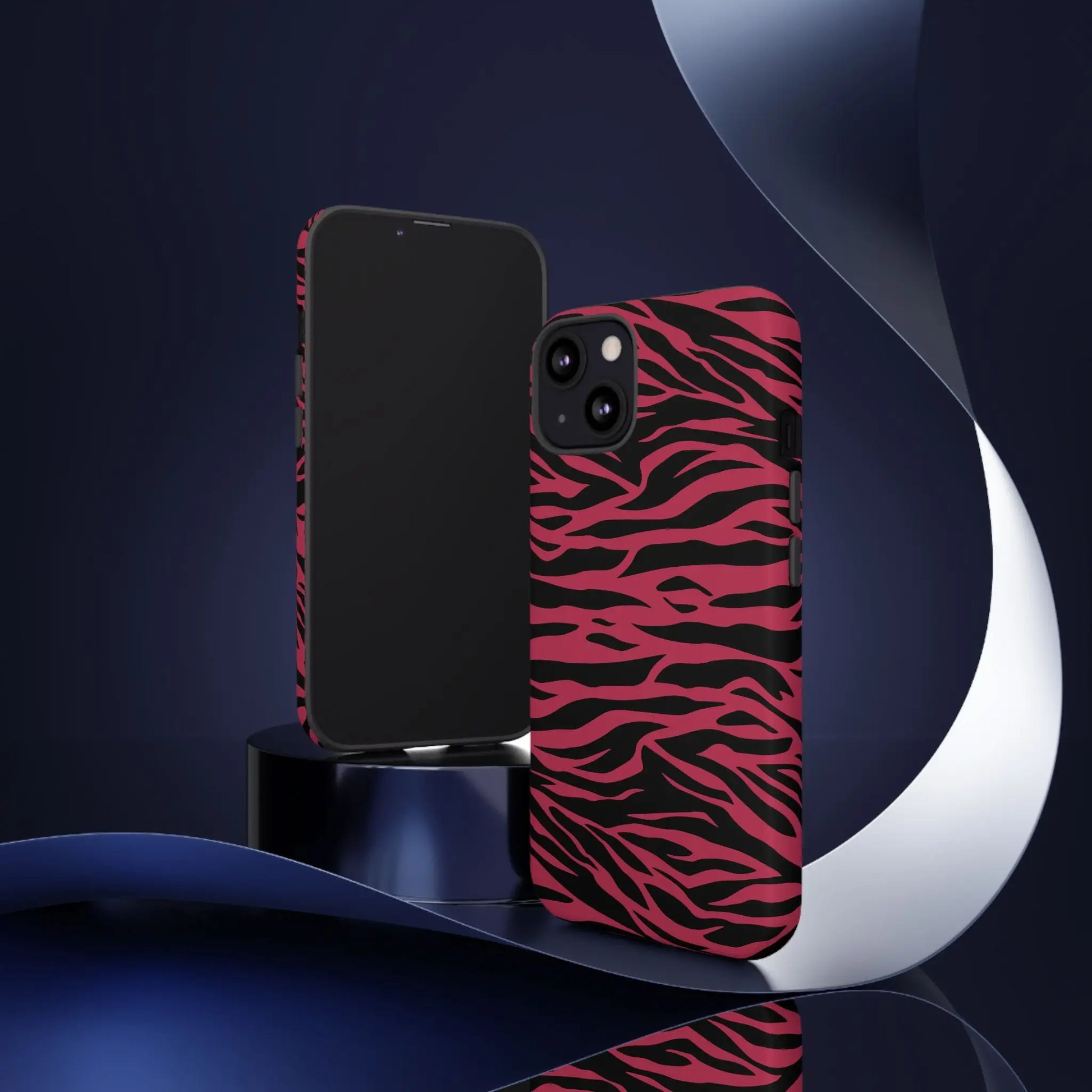 Vibrant pink and black zebra-striped phone case showing the back with a sleek magenta wild tiger pattern print design