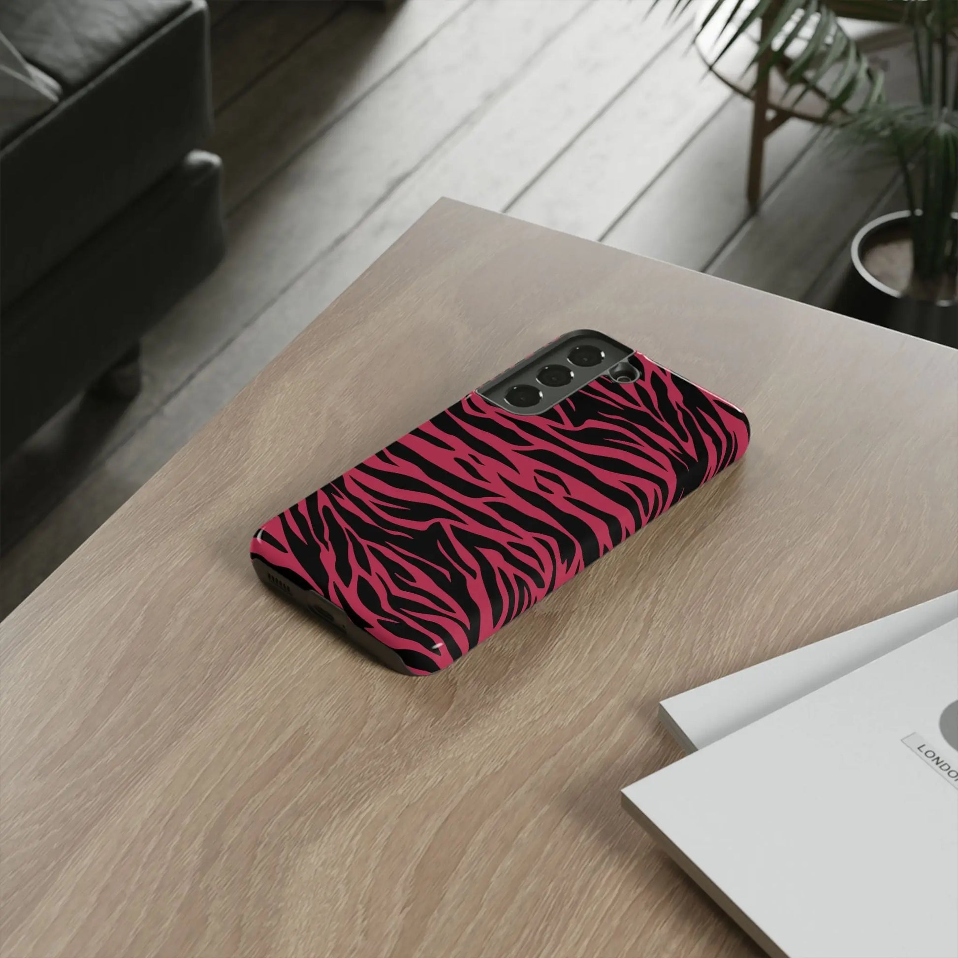 Magenta wild tiger pattern print phone case with vibrant pink and black zebra stripes and sleek protective design back side