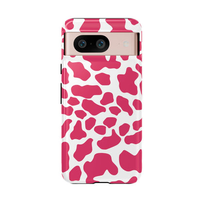 Vibrant pink cow print phone case cover with glossy finish showing back side for cute tough cases protection