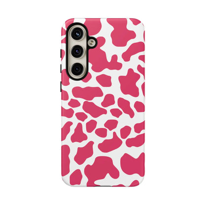 Vibrant pink cow print phone case cover with glossy finish showing back side for cute tough cases protection