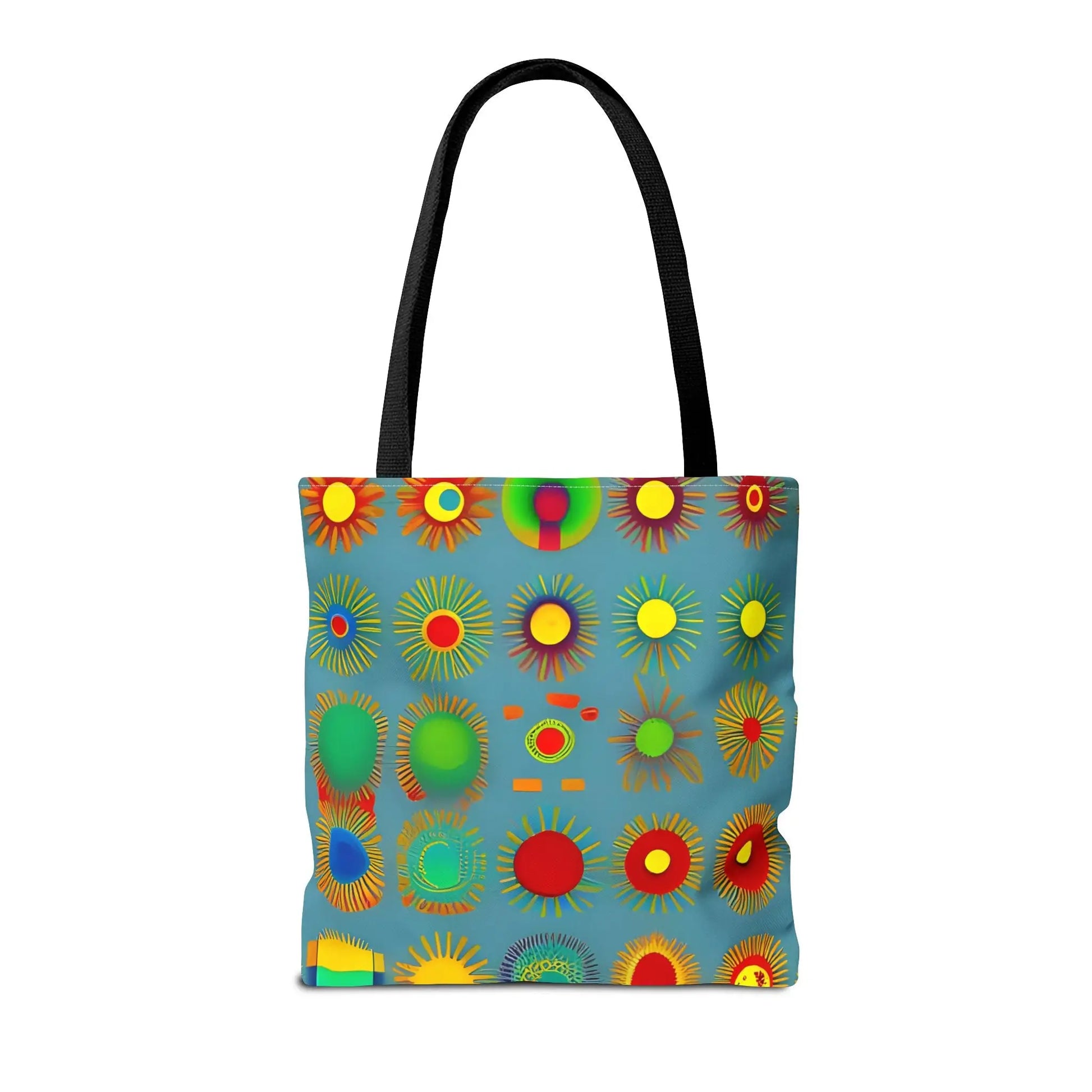 A vibrant blue sun pattern tote bag with black handles and colorful sunburst circles in red yellow green and orange