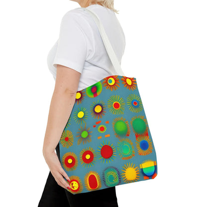 A vibrant blue canvas sun pattern tote bag featuring colorful sunburst circles in red green yellow and orange