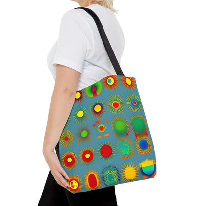 A vibrant blue sun pattern tote bag with colorful sunburst circles in red green yellow and orange pattern tote bag