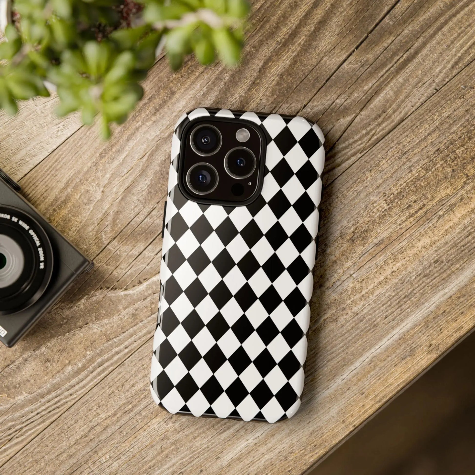 Back side of a white and black dimond tough phone case with diamond pattern for iphone google and samsung tough phone case